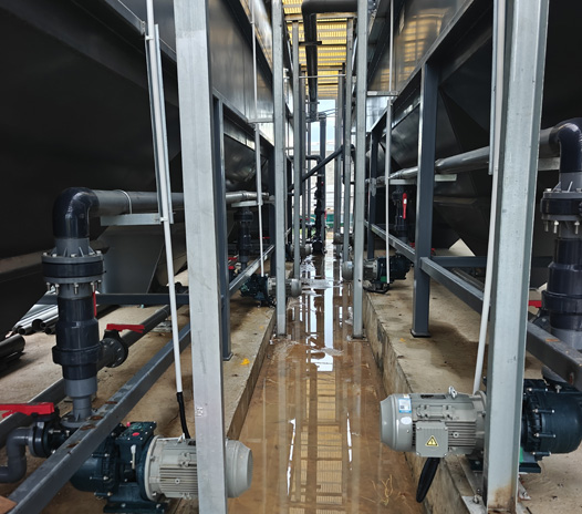 Panoramic-view-of-the-complete-skid-mounted-system,-including-the-wastewater-pretreatment-tank,-filter-press,-and-EDI-pure-water-unit;-featuring-RO-membrane-modules,-the-EDI-main-unit,-and-online-water-quality-monitoring-instruments.jpg